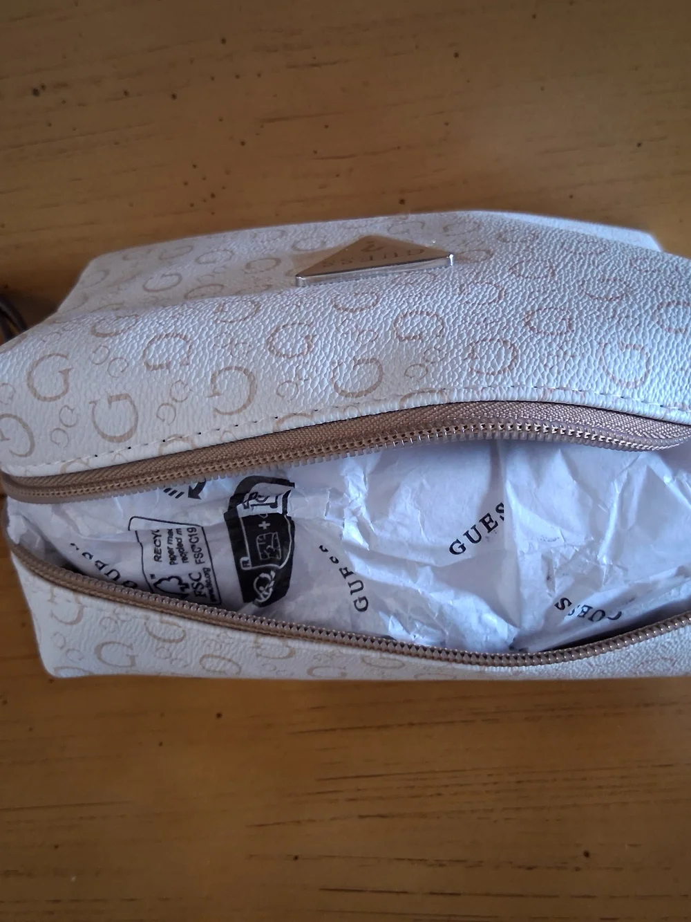 GUESS Cream Cosmetic Wristlet with Taupe Logo Trim